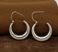 925 sterling silver handmade hoops kundal earring , amazing customized unisex jewelry from India, best brides maid customized jewelry. Metal-925 sterling silver. Item type-Hoops earring. Weight-9.880 grams approx. height-3.0 centimeters. Width-3.0 cm. Thickness-7 mm approx. Stamped-925. Makes excellent gifting for birthday, Christmas day, valentines day, wedding, anniversary, mother's day. Traditional Nickel-free Hoop Earrings, Traditional Round Nickel-free Hoop Earrings, Traditional Round Hoop Earrings Nickel Free, Festival Sterling Silver Hoop Earrings, Traditional Small Hoop Sterling Silver Earrings, Sterling Silver Hoop Earrings For Festivals, Traditional Sterling Silver Hoop Earrings With Ear Wire, Traditional Jewelry With Ear Wire For Festivals, Sterling Silver Chandbali Jewelry For Anniversary