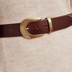 Andrea has boldly stepped onto the scene with vintage flair & classic style. Made statement size with full-grain premium leather, this classic women's belt for jeans & dresses features a large horseshoe buckle & matching gold keeper to create a familiar yet elevated design. Amsterdam Heritage is a leader in premium leather accessories for men & women. This fashionable women's belt pairs perfectly with one of our full-grain leather handbags. PRODUCT DETAILS • Width: 1.5" • Material: Full-Grain It Belt With Gold Buckle, Belt For Jeans, Handmade Leather Belt, Jeans Belt, Women's Belt, Leather Jeans, Jean Belts, Leather Buckle, Accessories For Men