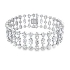 Indulge in luxury with our 22.46 Cts. 3 Row Mix Shape Natural Diamond Bracelet. Adorned with 45 brilliantly cut diamonds in oval and 45 round shapes, this exquisite bracelet boasts a total carat weight of 22.46. Elevate your style with the elegance and sophistication of this exclusive piece. DIAMOND 13.92 OV TCW 45 PCS. F-G SI1-SI2 &8.54 RD TCW 45 PCS. F-G SI1-SI2 BS-1793 Diamond Bracelets, Diamond Bracelet, Natural Diamonds, The Row, Diamond Cuts, Nature