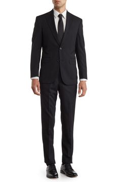 Whether it's an office occasion or a special event, this dapper suit crafted from luxurious wool with a classic design can do it all. 29 1/2" jacket length; 36 1/2" inseam; 15" leg opening; 9 1/2" front rise (size 34W) Jacket is lined; trousers are lined to the knee 100% wool Dry clean Imported Model stats: 6'1" height, 32" waist. Model is wearing size 40R. Dapper Suits, Suit Outfit, Ted Baker London, Suit Separates, Wool Suit, Suit And Tie, Special Event, Ted Baker, The Knee