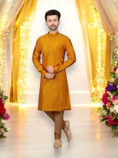 Comes with top and bottom Fabric - Silk Step into the world of festive celebrations with our Festive Wear Kurta Pajama. The vibrant mustard color adds a touch of radiance and joy to your attire, perfect for special occasions and cultural festivities. Crafted with precision and attention to detail, this ensemble showcases a perfect blend of tradition and modern style. Please take note of the following important information regarding the sizing of this Kurta: The chest sizes of this Kurtas is approximately 4 inches larger than the actual Kurta size. For instance, if you select a size 40 Kurta, it will have a chest size of approximately 44 inches or thereabouts. To ensure a comfortable fit and accommodate for different body types, we recommend considering purchasing Kurtas that are 2 inches b Festive Orange Kurta, Festive Orange Traditional Wear With Long Sleeves, Festive Long Sleeve Orange Kurta, Festive Orange Long Sleeve Kurta, Mustard Traditional Wear For Festivals, Festive Mustard Straight Kurta, Festive Mustard Traditional Wear For Festivals, Festive Mustard Sets For Diwali, Festive Mustard Sets For Eid