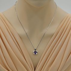 Inspired by a love of luxury Dress it up or dress it down. But don't leave the palace gardens without this crown jewel. This graceful pendant features an oval shape Peora natural Amethyst gemstone in .925 sterling silver. Our natural Amethyst gemstones are a unique gift from nature. By cutting them in a way that respects the rough's natural radiance, we ignite their inherent intensity and maximize their brilliance to deliver on our signature Peora standard. Handcrafted in pure .925 sterling silv Blue Sapphire Pendant, Sapphire Necklace Pendants, Sapphire Pendant, Citrine Gemstone, Swiss Blue Topaz, Gemstone Necklace Pendant, Unique Gifts For Her, Amethyst Pendant, Topaz Gemstone