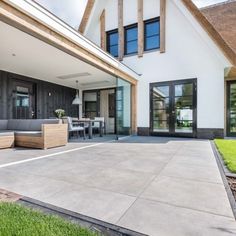 a large house with an outdoor living area