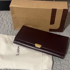 Gorgeous Genuine Leather Wallet From Jafferjees. Gold Hardware. Brand New, Never Used. Comes With Dust Bag And Box. Elegant Everyday Purple Wallets, Elegant Purple Everyday Wallet, Elegant Purple Wallets, Elegant Purple Bifold Wallet, Elegant Purple Wallet For Gift, Thirty One Wallet, Chloe Wallet, Leather Wallets For Men, Yellow Wallet