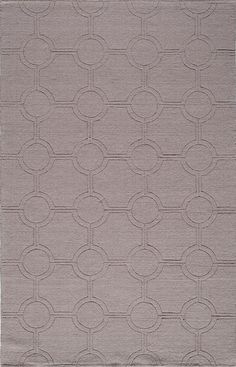 a gray rug with circles on it