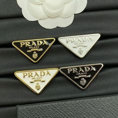 Prada Brooch - Iconic Luxury Accessory - prada brooch pin - - Inspire Uplift Prada Brooch, Prada Jewelry, Prada Logo, Pin Jewelry, Luxury Accessories, Pin Brooch, Elevate Your Style, Stylish Accessories, Timeless Pieces