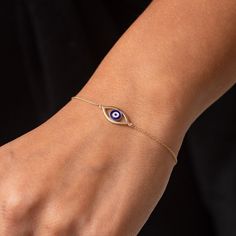 14k 18K Real Gold Enamel Evil Eye Bracelet, Dainty Navy Blue Enamel Eye Everday Bracelet is a Great Gift For Her, Blue Horus Eye Bracelet We can apply different colors of enamel according to your choice for this gold enamel horus eye bracelet. You can write it for customisation. This enamel evil eye bracelet is available with 14K gold and 18K gold options and yellow gold, white gold and rose gold colors. Material: Real gold, genuine solid gold Gold karat options: 14 karat, 18 karat Gold color op Blue Enamel Jewelry With Adjustable Chain, Gift Yellow Gold Enamel Bracelets, Blue Enamel Bracelet Jewelry, Blue Gold Bracelet For Gifts, Fine Jewelry Blue Gold Bracelet For Gift, Gold Enamel Bracelets With Adjustable Chain, Blue Gold Bracelet For Gift, Fine Jewelry, Evil Eye Enamel Jewelry As A Gift, Fine Jewelry 14k Gold Blue Bracelets