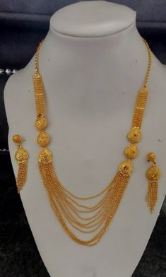 Indian and Ethnic Traditional Jewellery  Gold Bridal Neckless Set For Party ,Function ,Wedding  Design   No 10 = Wight 32 Grams Length 32cm  GOLD ROSSERY 11 LINES  Design   No 11 = Wight 85 Grams Length 40cm  GOLD ROSSERY 3 LINES Design   No 12 = Wight 60 Grams Length 32cm  GOLD ROSSERY 7 LINES Design   No 14 = Wight 50 Grams Length 32cm  GOLD ROSSERY 24 LINES Design   No 15 = Wight 95 Grams Length 48cm LONG SET 3 LINE GOLD FLOWER Design   No 16 = Wight 50 Grams Length 35cm  GOLD ROSSERY 6 LINES Gold Sets With Pallu For Marriage, Kundan Necklace With Latkans For Wedding, Bridal Necklace With Latkans For Celebration, Bridal Necklace With Latkans For Eid Celebration, Gold Bridal Necklace With Cut Dana For Festivals, Festive Sets With Intricate Design For Marriage, Festive Sets With Intricate Design For Weddings, Kundan Necklace For Marriage, Gold Bridal Necklace With Traditional Drape For Festivals