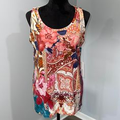 Chico’s Size Medium Touch Of Cool Basic Knit Top Sleeveless Floral Print New With Tags Condition Stretches Well - Rayon Spandex Material Smoke Free Home Multicolor Stretch Cami Top, Stretch Multicolor Cami Top, Fitted Multicolor Floral Print Tank Top, Spring Multicolor Stretch Vest, Fitted Red Floral Print Tank Top, Fitted Floral Print Sleeveless Vest, Spring Multicolor Stretch Tank Top, Spring Multicolor Stretch Camisole, Multicolor Tank Camisole For Spring