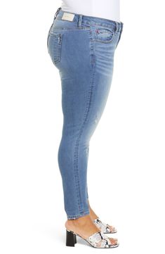 Designed in a casual-cool faded wash, these shapely mid-rise jeggings bring eye-catching appeal to your everyday look. 27 1/2" inseam; 11" leg opening; 10 1/2" front rise; 18" back rise (size 18W) Zip fly with button closure Five-pocket style 57% cotton, 27% rayon, 14% polyester, 2% spandex Machine wash, tumble dry Imported Stretch Medium Wash Jeggings With Frayed Hem, Stretch Distressed Jeans With Cropped Leg, Distressed Stretch Cropped Leg Jeans, Distressed Stretch Jeans With Cropped Leg, Stretch Distressed Cropped Leg Jeans, Stretch Medium Wash Cropped Jeans With Tapered Leg, Faded Stretch Mid-rise Bottoms, Stretch Mid-rise Faded Bottoms, Faded Stretch Denim Jeans