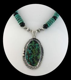 "For this White Fox Creation we started with sterling and turquoise pendant. The stone has both blue and green turquoise with oodles of heavy black matrices. Than we made a chain using both blue and green turquoise beads paired with black onyx and a dash of sterling. The pendant is not Native American made but the stone is a beauty and would compliment any Native American jewelry collection. Specifics: Metal: Sterling, Stamped 925 Stones: Turquoise Size of Pendant: 2 1/8\" long not counting the Turquoise Malachite Beaded Jewelry, Green Turquoise Gemstone Beads Necklace In Sterling Silver, Green Turquoise Necklace With Sterling Silver Gemstone Beads, Green Turquoise Necklace With Sterling Silver, Opalite Necklace, Onyx Necklace, White Fox, American Jewelry, Turquoise Pendant