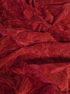 an image of red fabric that is very soft