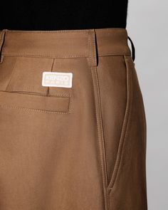 Tapered workwear straight pants.
KENZO Paris label placed on the back.
Unlined.
Two side pockets.
One phone pocket.
One coin pocket. Brown Work Pants With Welt Pockets For Business Casual, Brown Chinos With Pockets And Straight Hem, Business Casual Brown Work Pants With Welt Pockets, Workwear Straight Leg Chinos With Cargo Pockets, Work Pants With Patch Pockets, Straight Leg, Wide-leg Cargo Pants For Work With Welt Pockets, Classic Wide-leg Cargo Pants For Work, Business Casual Brown Work Pants With Pockets, Modern Workwear Cargo Pants With Patch Pockets