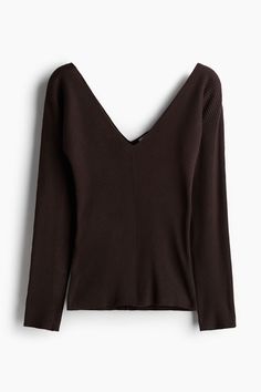 Fitted  long-sleeved top in a soft rib knit. Wide  low-cut V-neck at front and back. Solid Ribbed V-neck Knit Top, Seamless V-neck Knit Top For Fall, Stretch Ribbed V-neck Sweater, Trendy Ribbed V-neck Sweater With Stretch, V-neck Ribbed Sweater For Layering, Stretch Seamless V-neck Knit Top, Elegant Stretch Ribbed V-neck Sweater, Stretch V-neck Sweater With Ribbed Neckline, Casual Ribbed V-neck Long Sleeve Top