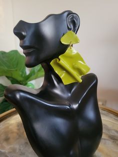 Shiny lime green earrings. Hypoallergenic post, lightweight, unique design. Trendy Green Drop Earrings, Neon Yellow Drop Earrings As A Gift, Modern Green Earrings, Trendy Green Dangle Jewelry, Green Dangle Earrings For Pierced Ears, Modern Green Drop Earrings, Neon Yellow Trendy Jewelry For Party, Modern Green Earrings As Gift, Handmade Green Earrings For Party