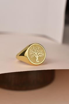 Welcome to LUXJ, Here you will find a beautiful selection of round signet rings with a variety of designs such as our Tree of Life signet ring. Our team is happy to assist you with any questions you may have and we look forward to creating these special jewelry for you. *The images are taken from us and you will receive your ring as shown* | Information about the ring | - Face Size: 14x14mm - Band width at the bottom: 4mm | Material | - Sterling Silver 925 - Gold Vermail (925 base) - 9K Real Gol Women's Signet Ring, Symbolic Signet Ring With Engraving Option, Personalized Symbolic Signet Ring, Symbolic Personalized Signet Ring, Signet Ring With Engraving Option As Gift, Round Signet Ring With Engraving Option As Gift, Gift Signet Ring With Engraving Option, Gold Tree Of Life, Schmuck Gold