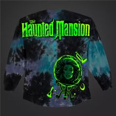 a black and green tie - dye shirt with the words, haunted mansion on it