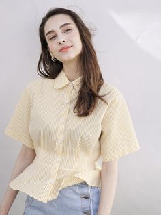 - Striped pattern- Cotton blend- Front button closure- Comfortable fit - Short length sleeves- Peplum top- Elastic band at back waistMeasurements- Length: 19.6in,  Shoulder width:15.9in,  Chest width:18.3in,  Sleeve length:9in*Model Info - Height :5’8”, Bust:32”, Waist:22”, Hip:33”Composition & Care- Outshell :65%polyester, 35%cotton- Hand-wash separately / Dry cleaning / Please check the care label. Designer- Made in Korea- by BIBYSEOB- Style#:300681267 Yellow Fitted Button-up Tops, Fitted Yellow Tops With Buttons, Yellow Fitted Short Sleeve Shirt, Fitted Yellow Short Sleeve Shirt, Yellow Button-up Tops For Workwear, Spring Tops With Back Button Closure And Short Sleeves, Summer Tops With Back Button Closure For Work, Classic Yellow Blouse, Yellow Short Sleeve Top With Buttons