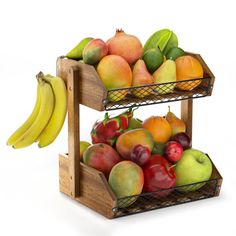 two wooden baskets filled with fruit on top of each other and bananas hanging from the sides