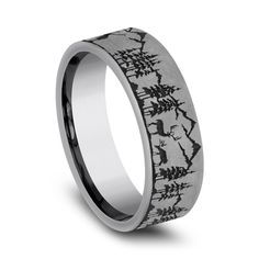 a wedding band with black and white designs