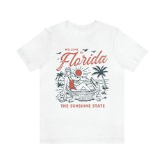 Looking for a stylish and unique gift? Check out our Welcome to Florida Vintage Tshirt! This vintage tee is the perfect addition to any wardrobe and makes for a great gift for her or him. With a custom design and high-quality graphic tee printing, this tshirt is perfect for any occasion, from birthdays to retro-inspired events. Available in a variety of sizes and styles, including custom tees for women, our Welcome to Florida Vintage Tshirt is a trendy and fashionable choice. So why wait? Order your Welcome to Florida Vintage Tshirt today and add some retro-inspired flair to your wardrobe! .: 100% Airlume combed and ringspun cotton (fiber content may vary for different colors) .: Light fabric (4.2 oz/yd² (142 g/m .: Retail fit .: Tear away label .: Runs true to size Retro White Print Crew Neck T-shirt, Vintage Cotton T-shirt As Gift, Summer Gift T-shirt With Text Print, Retro Relaxed Fit T-shirt With Sublimation Print, Summer T-shirt With Sublimation Print For Gift, Retro Short Sleeve T-shirt For Gifts, Retro Short Sleeve T-shirt As A Gift, Retro Short Sleeve T-shirt As Gift, Retro Graphic Print Top For Gift