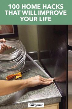 a person is removing the glass from an oven