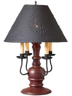 a wooden table lamp with two lights on each side and a black shade over the top