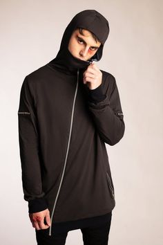 ► GARMENT ◄- Relaxed fit hoodie- High neck that covers the nose and mouth when fully zipped- Asymmetrical front zip- 2 zip pockets at waist- 2 mini zip pockets at bicep- Fully lined in either dusty blue or stone- Charcoal gray body with black cuffs and hem- Fitted hood► FABRIC ◄This garment is made from 100% organic cotton. This impeccably soft and comfortable organic cotton jersey is GOTS certified. Because real style goes beyond what you wear.► CARE ◄Our garments are made utilizing unique dye Casual Winter Sweatshirt With Asymmetrical Zip, Streetwear Sweatshirt With Zip Cuffs And Long Sleeves, Black Hooded Jacket With Zip Cuffs, Streetwear Long Sleeve Sweatshirt With Zip Cuffs, Fall Hoodie Track Jacket With Zipper, Streetwear Hoodie With Zip Cuffs And Long Sleeves, Streetwear Hoodie With Zip Cuffs, Streetwear Long Sleeve Hoodie With Zip Cuffs, Long Sleeve Hoodie With Zip Cuffs For Streetwear