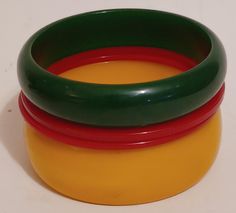 Gorgeous set of 4 bakelite bracelets one green and one yellow with2 redspacers. Excellent used condition tested and authentic. Please see all photos. Approx 1/4" to1" 2.5" opening  As The owners of beyond bakelite want you to have the best experience. All items are used and handpicked and thoroughly described with any flaws or condition issues. All items are shipped within 1 to 3 business days and insured. We do reuse boxes and some supplies to keep costs down and it's great for the environment. Reuse Boxes, Bakelite Bracelets, Bakelite Bangles, Red Green Yellow, Bangle Set, Green Yellow, Want You, Bangle Bracelets, Happy Shopping