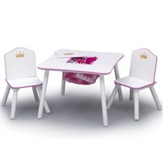 children's table and chairs with pink flowers in the center on an isolated white background