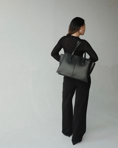 Sleek and structured, the Paloma is our bestseller for so many reasons. Perfect for work, the zipped middle compartment carries up to 16" laptops (measured diagonally), and two side compartments fit up to 13" laptops or important documents. Features a multitude of interior pockets to help you stay organized, comfortable 2cm wide straps that won't dig into your shoulder, and a shortened zipper track for easy access to your water bottle. This bag means business, so you can walk into every room with confidence. Handcrafted from the finest vegan ultrafiber, and lined in tan microsuede. Important Documents, Foundation Piecing, Black Luxury, Work Bag, Leather Zipper, Stay Organized, Accessories Branding, Wide Straps, Paloma