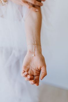 Beautiful dainty bracelet with delicate freshwater pearl center. 925 silver with 18k gold plating 925 silver with Rhodium plating Length is approximately 16cm READY TO SHIP - Ships in 1 to 3 business days Delicate Oyster Bracelet Jewelry For Wedding, Delicate Oyster Bracelet For Weddings, Delicate Wedding Jewelry With Oyster Bracelet, Pearl Bracelet With Pearl Drop, Adjustable Pearl Oyster Bracelet Jewelry, Dainty Jewelry Oyster Bracelet For Gift, Pearl Drop Bracelet Jewelry, Dainty Oyster Bracelet Jewelry Gift, Elegant Adjustable Bracelet With Pearl Pendant