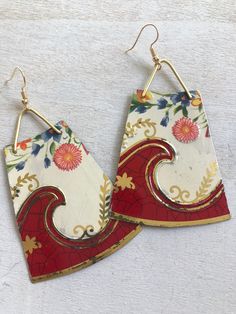 Vintage 1960's tin from England, rare in it's kind, beautiful bold red and cream with gold. Each piece is handmade and one of a kind, so please allow for some slight variations. Due to it's age there may be some scratches or dents or maybe a small amount of rust. The earrings are light weight and can be slightly flexible. Finished with nickel free metal ear wires. Care Instructions: These earrings are made to last, but I still recommend handling them gently and removing them before bathing, appl Tin Earrings, Earth Colors, Tin Art, Boho Design, Boho Designs, Handmade Boho, Estilo Boho, Vintage 1960s, Vintage Boho