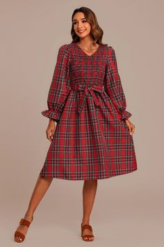 Fall V-neck Ruched Smocked Top, Fall Smocked Bodice Knee-length Dress, Fall Knee-length Smocked Dress With Smocked Bodice, Fall Smocked Dress With Elastic Sleeves, Red Dress With Smocked Back For Fall, Red Smocked Back Dress For Fall, Fitted V-neck Smocked Top For Fall, Fall Daywear Smocked Top, Fall Knee-length Smocked Dress With Smocked Cuffs