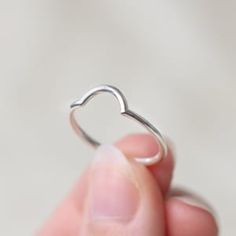 Hypoallergenic Round Band Wedding Rings, Hypoallergenic Toe Ring For Wedding, Promise Stackable Heart Ring, Tiny Heart-shaped Ring For Anniversary, Tiny Heart Ring For Anniversary, Adjustable Stackable Heart Ring For Wedding, Halo Stackable Rings With Round Band For Gift, Tiny Sterling Silver Wedding Rings, Stackable Halo Rings With Round Band For Gift