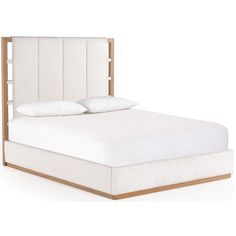 a bed with white linens and wood frame headboard on an isolated white background