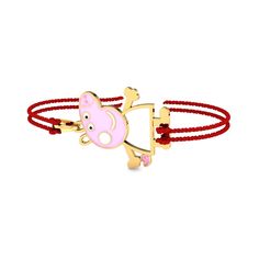 A rakhi (bracelet made of thread, having a solid gold pendant in the center to which the thread is tied) that is made of 18K gold with diamonds. A Enamelled Pepppa Pig styled real gold rakhi for your kid brother to make this Raksha Bandhan super special for him. It's not just about the gold rakhi, but the whole package that he receives. The rakhi comes inside a posh gift box that completely elevates the gifting experience for both of you . Satin threads are provided on either side and it comes i Traditional Adjustable Gold Bracelet Gift, Traditional Adjustable Gold Bracelet For Gift, Traditional Adjustable Gold Bracelet As A Gift, Adjustable Yellow Gold Bracelet For Festive Occasions, Pink Adjustable Jewelry For Puja, Traditional Gold Bracelet With Sliding Knot, Adjustable Yellow Gold Jewelry For Puja, Raksha Bandhan, Peppa Pig