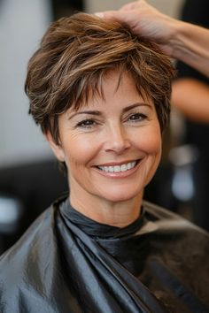 Click for More ➡️ | Save for Later ❤️  A warm caramel-toned pixie crop with subtle layers that add softness and movement. This style is ideal for women with older, thin hair, looking for a flattering and warm appearance. (Warm Caramel Pixie Crop - Short Pixie Hairstyles For Women Over 50) Short Spikey Haircut For Women, Short Hairstyles For Women With Thick Hair Over 60, Funky Pixie Cut For Thick Hair, Layered Short Hair For Older Women, Short Hairstyle Women With Thick Hair, Short Haircuts For Fine Hair Over 50, Best Pixie Cuts For Fine Hair, Pixie Haircut For Older Women Over 60, Layered Pixie Cut With Bangs