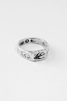 In all directions you'll find overarching freedom and unrestrained movement. The Swallow Signet features a careful line drawing in a slimline, rectangular face, crafted from 925 sterling silver. Lightly hammered edges portray the careful workmanship channelled into each piece. The Swallow Signet is unisex, designed to fit and suit you all.  Take a leaf out of the Merchants book and pair with the Forum Band. Rectangular Face, Signature Fonts, Silver Engraving, Recycled Silver, Recycled Sterling Silver, Engraved Rings, Signet Ring, Line Drawing, Gold Vermeil