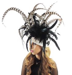 Spring Summer Collection Cinna Fascinator Base measures 12 inches Beautiful Lady Amhurst Natural Pheasant Tail Feathers (please note they are naturally a greyish tone and not a brilliant white) hand curled with a mass of coque and hackle. We can do this in other colours. please email us for colour requests. With black headband Due to the size this must be sent UPS Please be aware that all fascinators & hats are made to order and during busier times during April May & June dispatch can ta Feathered Fascinator For Races, Black High Crown Fascinator For Kentucky Derby, Feather Hair Accessories For Summer Evenings, Feather Hair Accessories For Summer Evening, Black High Crown Hat For Royal Ascot, Black Short Brim Headpiece For Summer, Black Summer Headpiece With Short Brim, Black Headpiece For Summer Races, Summer Evening Hair Accessories With Feathers