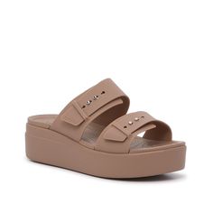 Crocs-Brooklyn Low Wedge Sandal - Women's Enjoy the comfort of Crocs and the style of your favorite wedges with the Brooklyn Low sandals. Crafted with a contoured footbed with massaging nubs so you can feel your best all day long. These wedges sit on top of a platform and feature a double strap design for a casually cool look. Crocs Brooklyn Low Wedge, Crocs Brooklyn, Low Sandals, Low Wedge Sandals, Crocs Sandals, Low Wedges, Strap Design, Wedge Sandal, Wedge Sandals