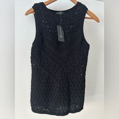 New With Tag Black Crochet Top With Attached Inside Liner/Tank Top Inc Size M Black Sleeveless Crochet Top Casual, Black Sleeveless Knit Top For Summer, Black Sleeveless Casual Crochet Top, Black Casual Sleeveless Crochet Top, Sleeveless Black Knit Top For Summer, Black Sleeveless Crochet Top For Beach, Black Sleeveless Crochet Top, Black Sleeveless Crochet Top For Spring, Chic Black Sleeveless Crochet Top