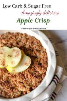 an apple crisp in a white bowl on top of a table with text overlay