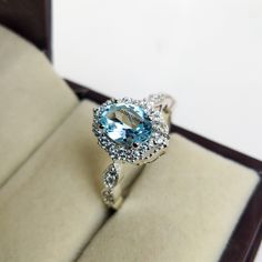 "Natural Blue topaz Ring For Women, Engagement Ring, Anniversary Ring, Best Ring For her, Jewelry for Girls, Proposal Ring, Promise Ring Specifications :- ❥ Stone - Natural Sky Blue Topaz ❥ Stone Size - 6x8mm  ❥ Cut Type - Oval ❥ Side Stones- Simulated diamonds Cz ❥ Ring Size: I offer more than one (Contact us if your ring size is not available in the listing) ❥ Color: Silver, Gold, Rose Gold, White Gold or Black Rhodium ❥ Material : 925 Sterling Silver, 14K/18K/22K Solid Gold --> ❥ Makes a Wonderful Gift for your Girlfriend, Wife, Mother and Friend or Simply an Excellent Addition to Your Jewelry Collection -->IF YOU WANT CUSTOM ENGRAVING ON YOUR RING VISIT OUR LISTING HERE: It's Only 2 USD https://www.etsy.com/listing/1436332485/custom-engaraving - -Here's a link to my HOMEPAGE: Johrifine Light Blue Topaz Ring With Diamond Halo Setting, Light Blue Diamond Ring With Accent Stones, Light Blue Diamond Rings With Accent Stones, Light Blue Topaz Halo Ring With Diamonds, Fine Jewelry Light Blue Diamond Ring With Center Stone, Light Blue Diamond Ring With Center Stone, Light Blue Diamond Ring For Anniversaries, Light Blue Diamond Rings With Prong Setting, Light Blue Aquamarine Diamond Ring With Center Stone