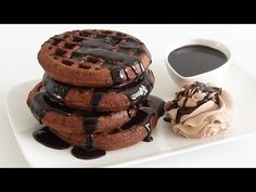 chocolate waffles and ice cream on a white plate