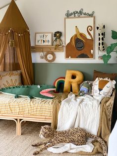 a child's bedroom decorated in animal themed decor