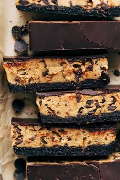 chocolate and peanut butter bars are stacked on top of each other