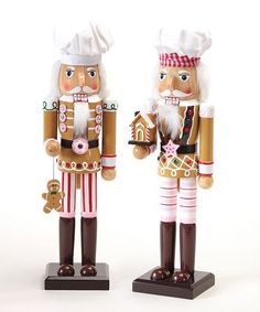 two nutcrackers are standing next to each other