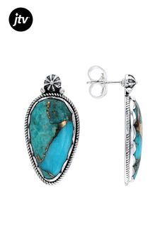 Indulge in the mesmerizing beauty of these exquisite Southwest Style by JTV ���earrings! Each earring features a captivating 25x13mm Blue Copper Composite Turquoise gemstone, carefully crafted to showcase its stunning natural hues. The composite turquoise pieces bound together create a unique and eye-catching design that is sure to turn heads.  Crafted with precision, these sterling silver earrings boast impeccable detail and quality. The intricate bezel setting enhances the allure of the pear-s Fine Jewelry Turquoise Oval Earrings, Turquoise Oval Fine Jewelry Earrings, Turquoise Oval Earrings Fine Jewelry, Fine Jewelry Oval Turquoise Earrings, Turquoise Sterling Silver Earrings - Fine Jewelry, Turquoise Sterling Silver Earrings Fine Jewelry, Turquoise Sterling Silver Fine Jewelry Earrings, Fine Jewelry Turquoise Earrings, Turquoise Fine Jewelry Earrings For Pierced Ears