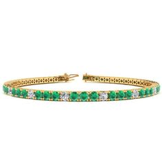 This classic gemstone bracelet features shimmering white diamonds in J-K color, I1-I2 clarity and emerald gemstones. The 6 inch bracelet contains 58 gemstones and diamonds at 3.92 carats. The 6.5 inch bracelet contains 60 gemstones and diamonds at 4.05 carats. The 7 inch bracelet contains 65 gemstones and diamonds at 4.39 carats. The 7.5 inch bracelet contains 70 gemstones and diamonds at 4.73 carats. The 8 inch bracelet contains 74 gemstones and diamonds at 5 carats. The 8.5 inch bracelet conta Black Diamond Bracelet, Diamond Bracelet Design, Emerald Bracelet, Emerald Engagement Ring Cut, Classic Bracelets, Bangles Jewelry Designs, Diamond Tennis Bracelet, Emerald Cut Diamond, Green Gems